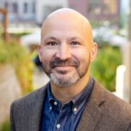 Headshot of Adam Sterling